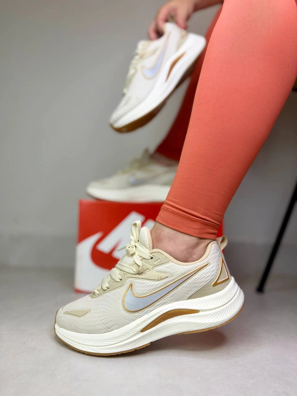 Tênis Nike Fit Dourado